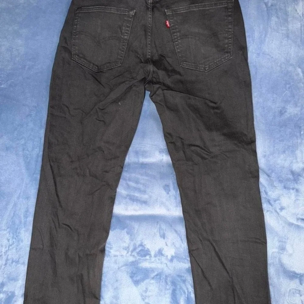Levi's black denim jeans, men Size W36 L32‎